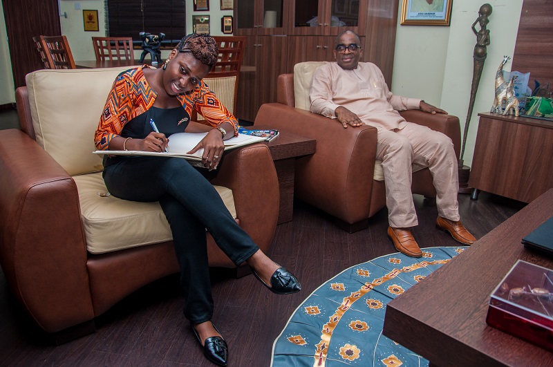 Bellafricana-founder-signs-with-Mr-Segun-Awolowo-image